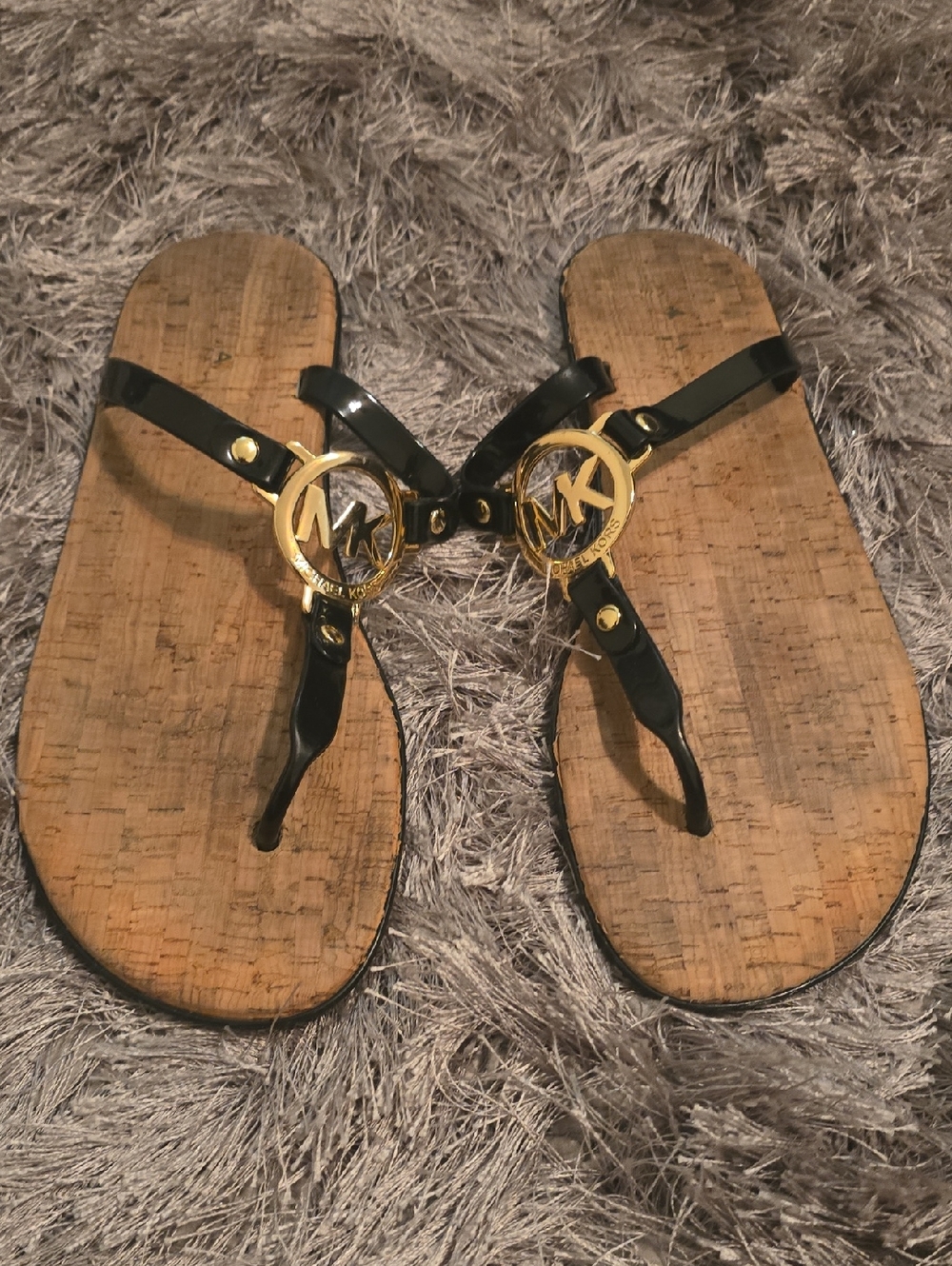 Michael Kors Black Patent Thong Sandals with Gold MK Medallions